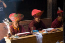 Monks chanting - hats go on
