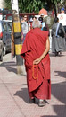 Buddhist monk walking down main street in Leh